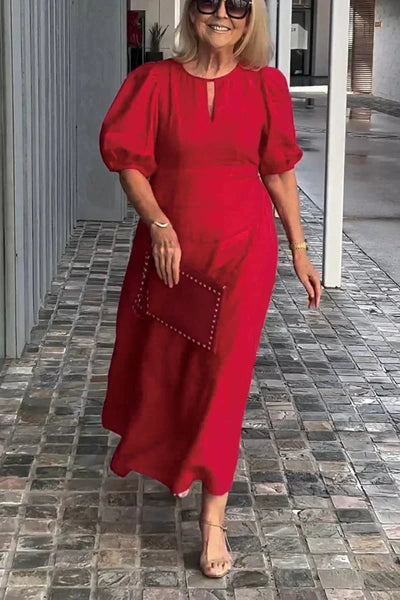 "Natalia | Zeitloses Eleganzkleid" could be rewritten as "Natalia | Klassisches Eleganzkleid".